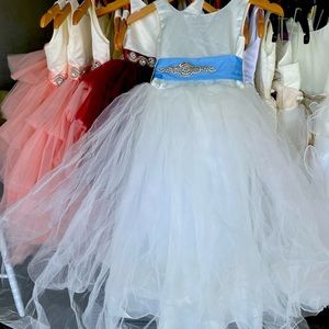 All new girls dresses ranging in size. Never been worn. Brand new. $55 per